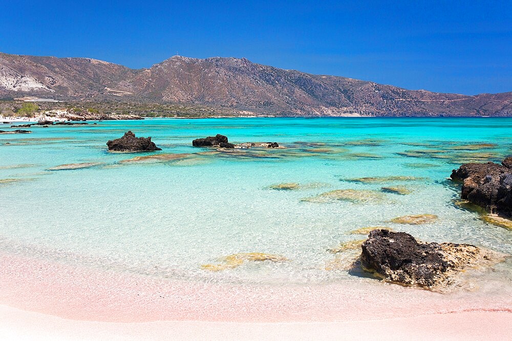 View across Vroulia Bay from beach of typically pink sand, Elafonisi Island, Elafonisi, Hania (Chania), Crete, Greek Islands, Greece, Europe