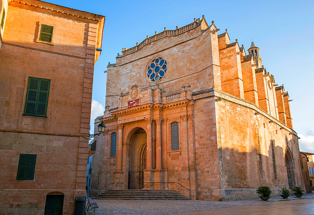 Golden sandstone facade of the Cathedral of Santa Maria, sunrise, Ciutadella (Ciudadela), Menorca, Balearic Islands, Spain, Mediterranean, Europe