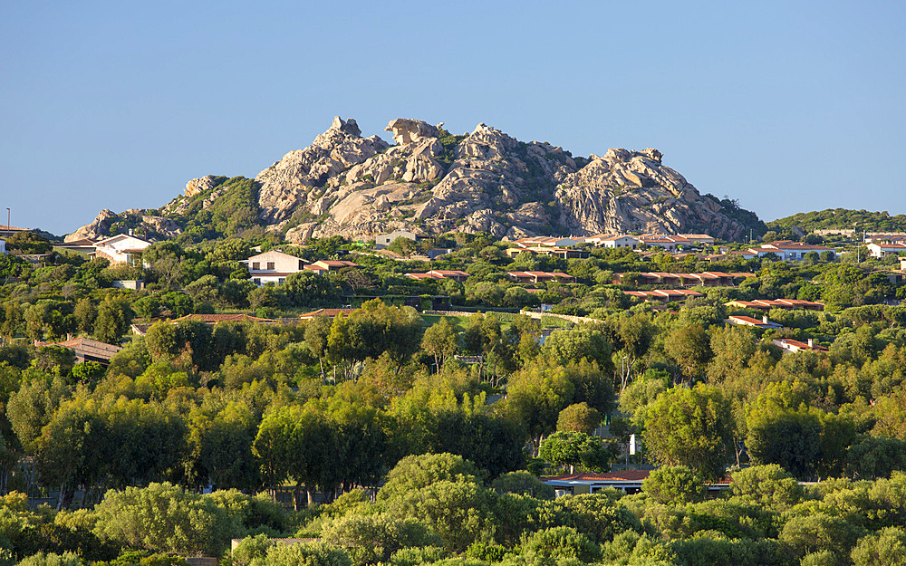 View across wooded landscape to the Roccia dell'Orso (Bear Rock), evening, Capo d'Orso, Palau, Sassari, Sardinia, Italy, Mediterranean, Europe