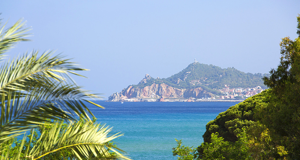 Panoramic view across turquoise sea to Arbatax and Capo Bellavista, Santa Maria Navarrese, Baunei, Nuoro, Sardinia, Italy, Mediterranean, Europe