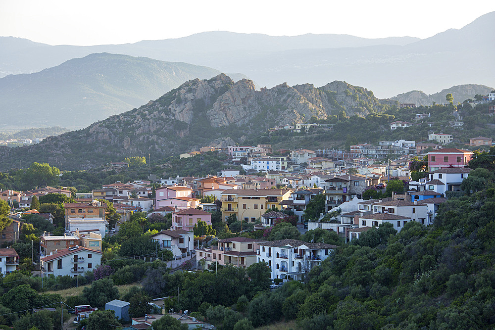 View over village rooftops from hilltop viewpoint, sunset, Santa Maria Navarrese, Baunei, Nuoro, Sardinia, Italy, Mediterranean, Europe