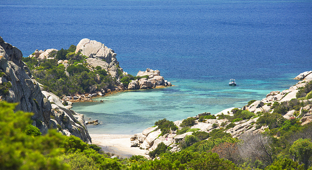 View from rocky hillside over the calm turquoise waters of Cala Napoletana, Caprera Island, La Maddalena Archipelago National Park, Sassari, Sardinia, Italy, Mediterranean, Europe