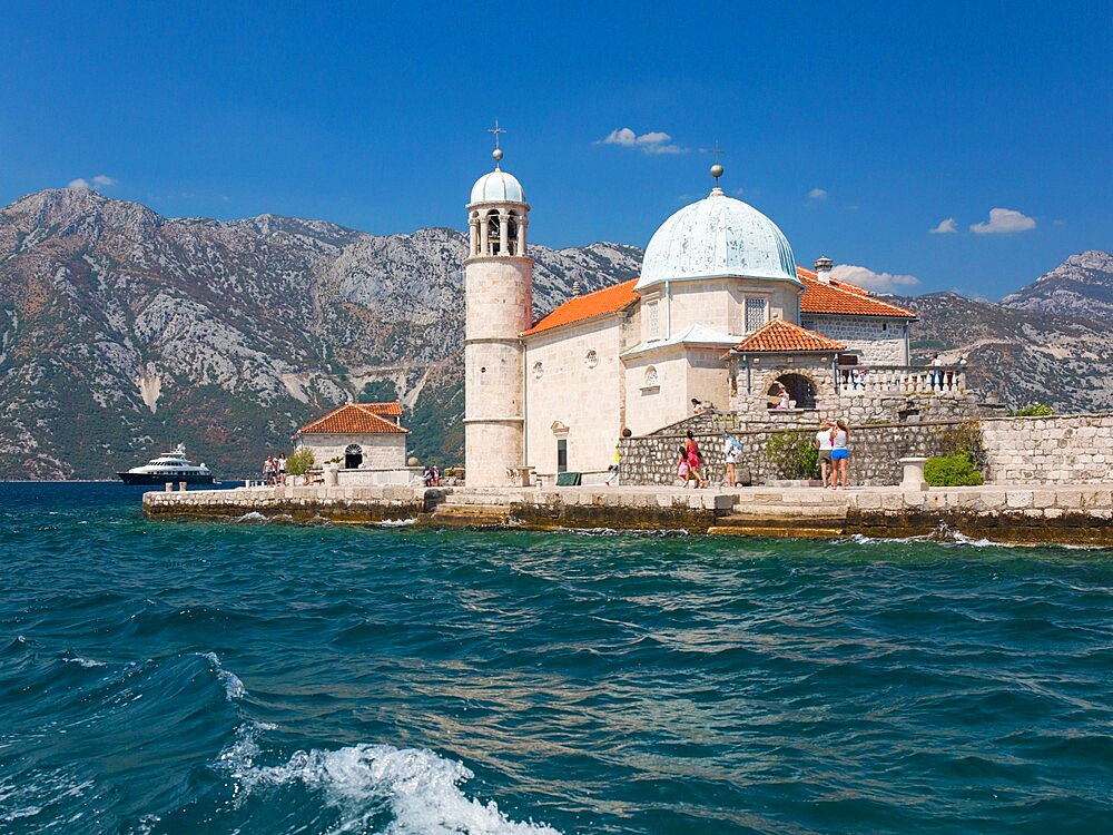 View from sea to the Church of Our Lady of the Rocks, Gospa od Skrpjela, Bay of Kotor, Perast, Kotor, UNESCO World Heritage Site, Montenegro, Europe