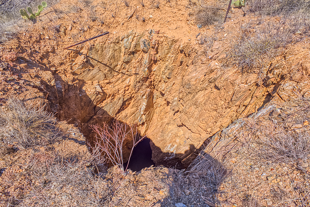 Open mine shaft at the Richinbar Mine within the Agua Fria National Monument north of Black Canyon City Arizona. Mine was established in 1905 but was abandoned in 1940 when the company that owned it went bankrupt.