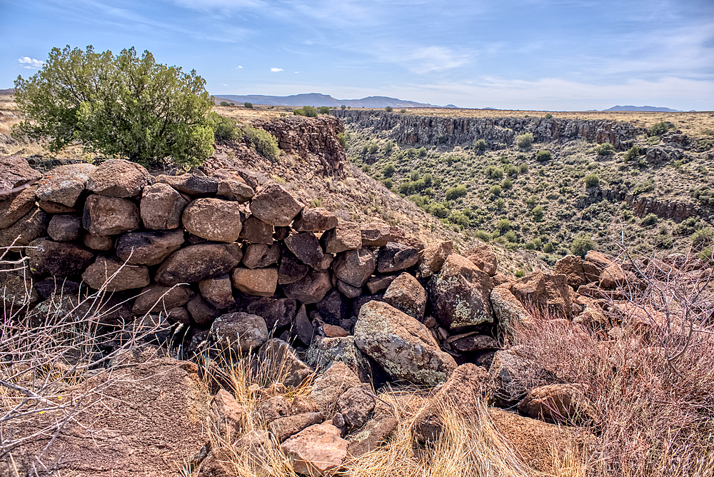 Ancient wall of the Fort Silver Indian Ruins overlooking Silver Creek Canyon in Agua Fria National Monument of Arizona. Located near the Pueblo La Plata ruins.