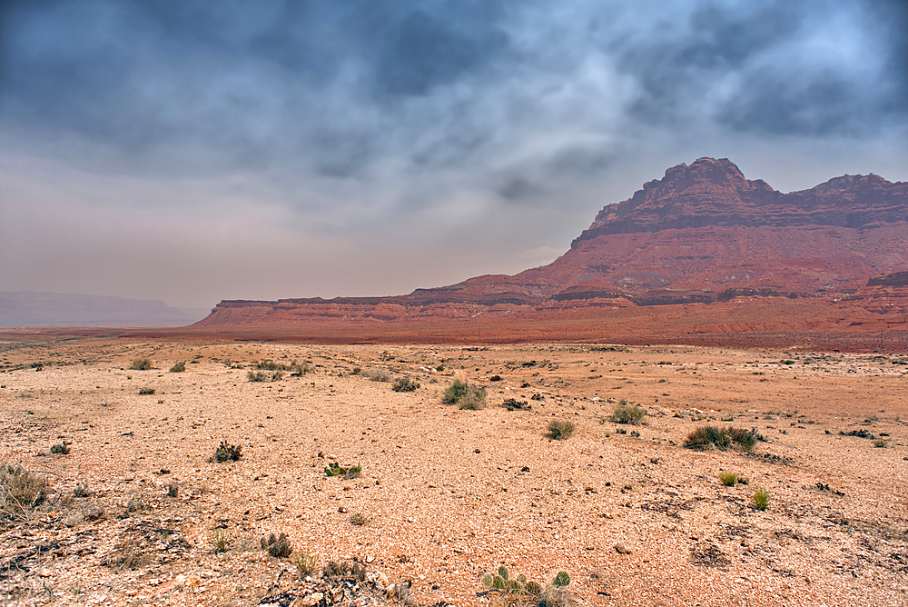 Echo Cliffs near Marble Canyon Arizona enshrouded with smoke from the Dragon Bravo Wildfire burning on Grand Canyon North Rim.