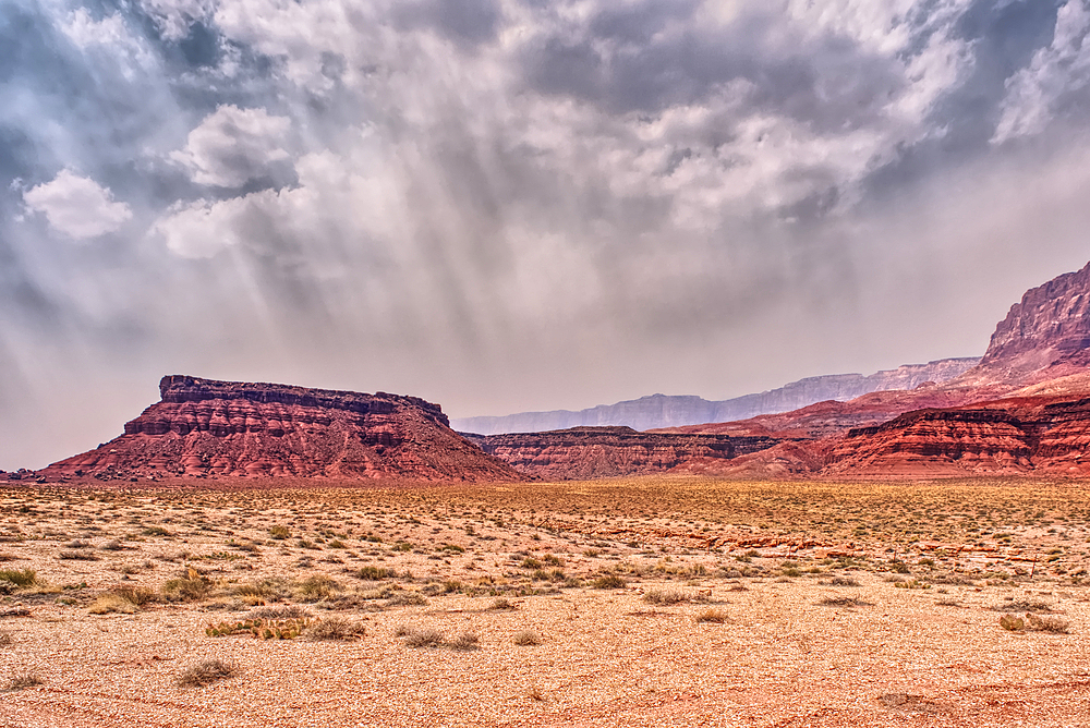 Vermilion Cliffs at Marble Canyon Arizona enshrouded with smoke from the Dragon Bravo Wildfire burning on Grand Canyon North Rim. Viewed from US89A.