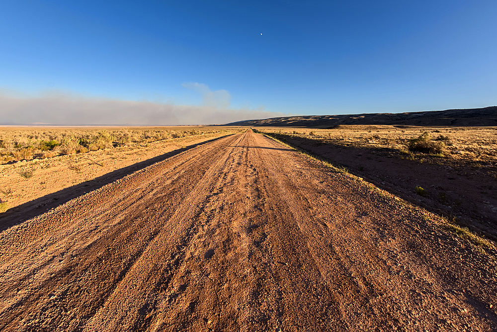 Smoke from the Dragon Bravo Wildfire burning on Grand Canyon North Rim billowing off the Kaibab Plateau. Viewed north of US89A across from Vermilion Cliffs.