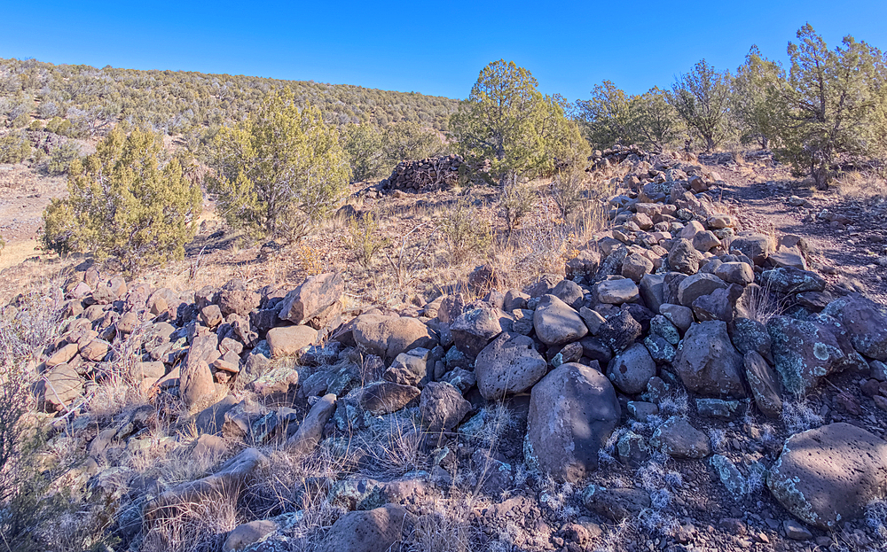 The remains of a rock wall built by ancient Indians along the Stone to Steel Trail that runs between the historic Stone Dam and Bainbridge Steel Dam near Ash Fork Arizona.