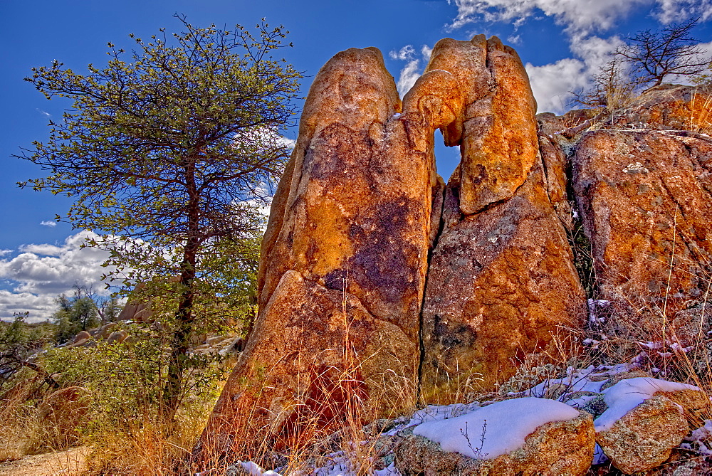 A granite rock formation along the Hole in the Wall Trail in Constellation Park in Prescott giving the trail its name, Arizona, United States of America, North America