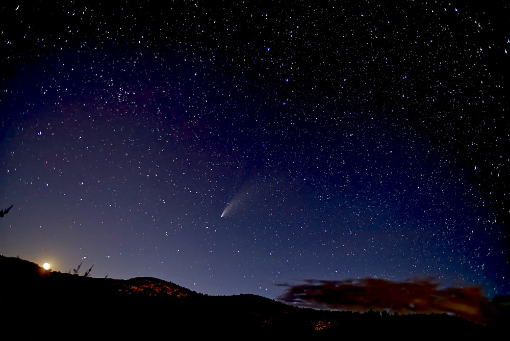 Comet NeoWise 2020 above Sullivan Butte in Chino Valley, with the Moon on the lower left and the Big Dipper in the center, Arizona, United States of America, North America