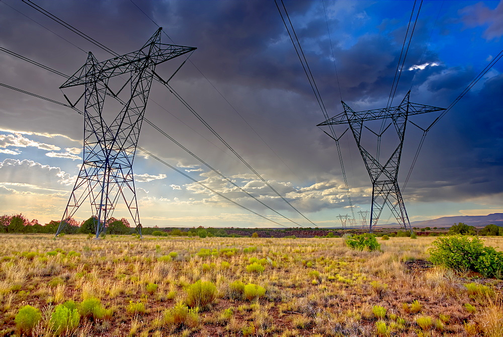 High voltage power lines stretching across Hell Canyon east of Paulden, located in the Prescott National Forest, Arizona, United States of America, North America