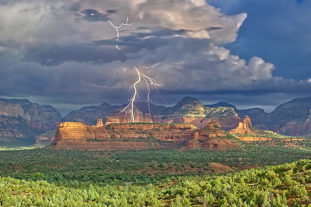 Red Rock Wilderness Lightning, a morning lightning storm over the Secret Red Rock Mountain Wilderness in Sedona, Arizona, United States of America, North America