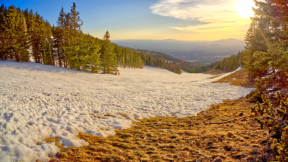 The slopes of Arizona Snow Bowl facing west close to sundown, Coconino National Forest near Flagstaff, Arizona, United States of America, North America