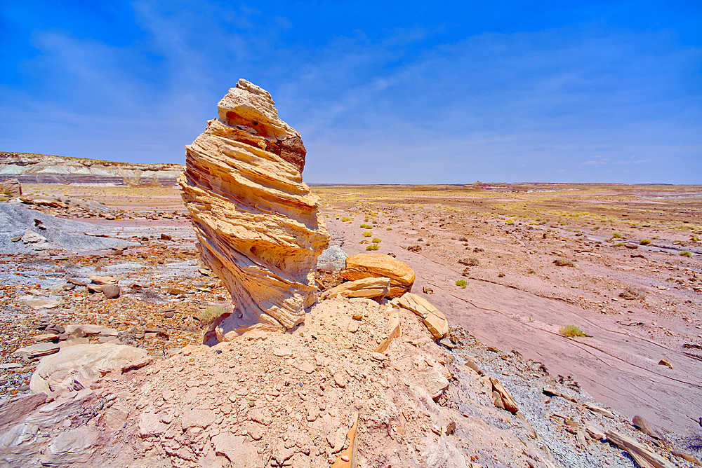 A hoodoo formation called Medusa's Child, below the cliffs of Agate Plateau in Petrified Forest National Park, Arizona, United States of America, North America