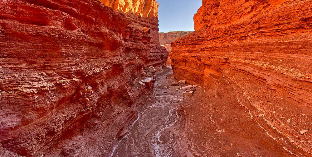 Upper Cathedral Wash in Glen Canyon Recreation Area with path leading to the Vermilion Cliffs, Arizona, United States of America, North America