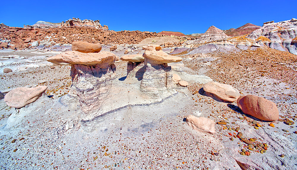 Three hoodoos in a triangular formation in Devil's Playground called the Unholy Trinity, Petrified Forest National Park, Arizona, United States of America, North America