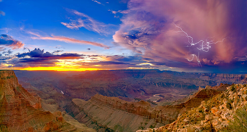 A dying storm at twilight viewed from Lipan Point, Grand Canyon, with Spider Lightning visible, Grand Canyon National Park, UNESCO World Heritage Site, Arizona, United States of America, North America