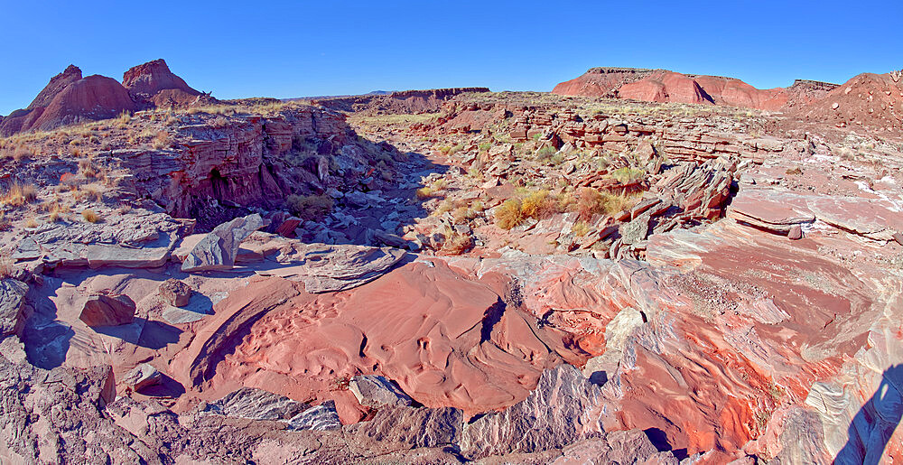 View of Tiponi Gap in the distance from the dry cliff of Tiponi Gap Falls in Petrified Forest National Park Arizona.