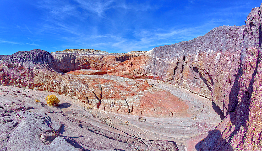 An area of the Red Basin in Petrified Forest National Park Arizona where the purple bentonite transitions into red for which the basin is named.