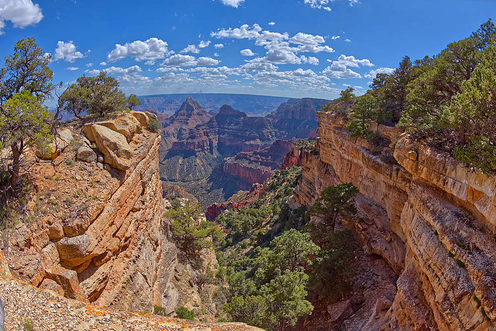 A narrow canyon along the south cliffs of Cape Final on the North Rim, with the pointed peak of Freya's Castle in the distance, Grand Canyon, Arizona, United States of America, North America