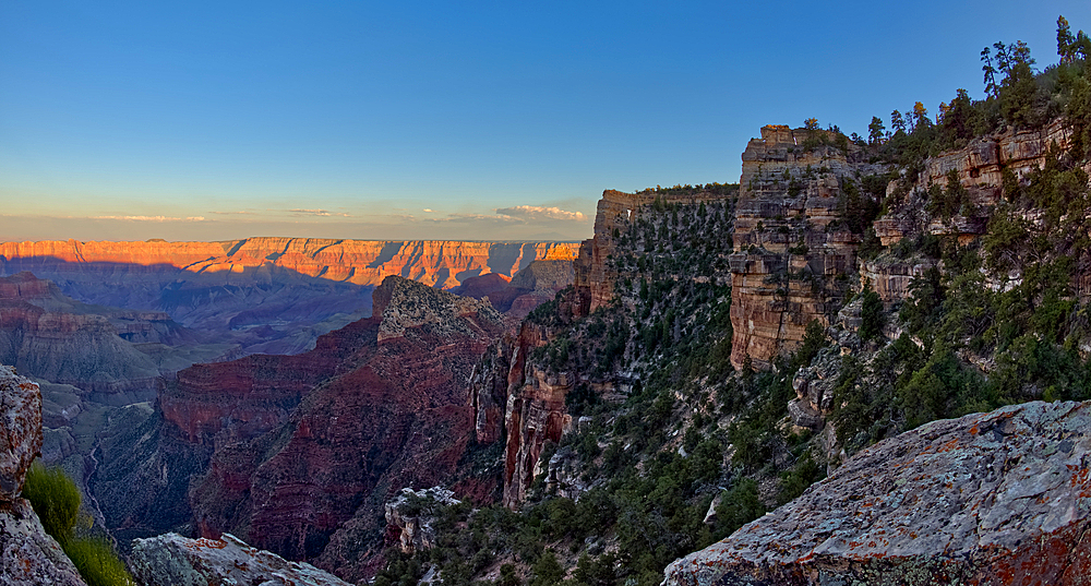 Angel's Window at Cape Royal on North Rim above Unker Creek near sundown, with smoke from a wildfire creating brown haze on the horizon, Gand Canyon National Park, UNESCO World Heritage Site, Arizona, United States of America, North America