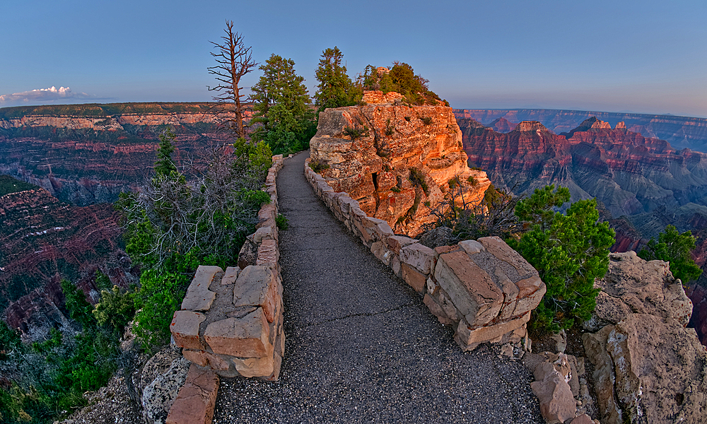 The paved pathway between Bright Angel Point and the visitor center at Grand Canyon North Rim at twilight, Grand Canyon National Park, UNESCO World Heritage Site, Arizona, United States of America, North America