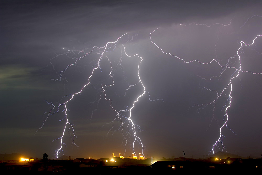 Multiple lightning bolts striking a power plant in Arlington during the 2016 monsoon season, Arizona, United States of America, North America