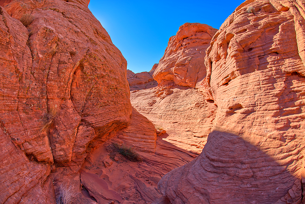 A narrow canyon leading onto a rock island at Ferry Swale in the Glen Canyon Recreation Area near Page, Arizona, United States of America, North America