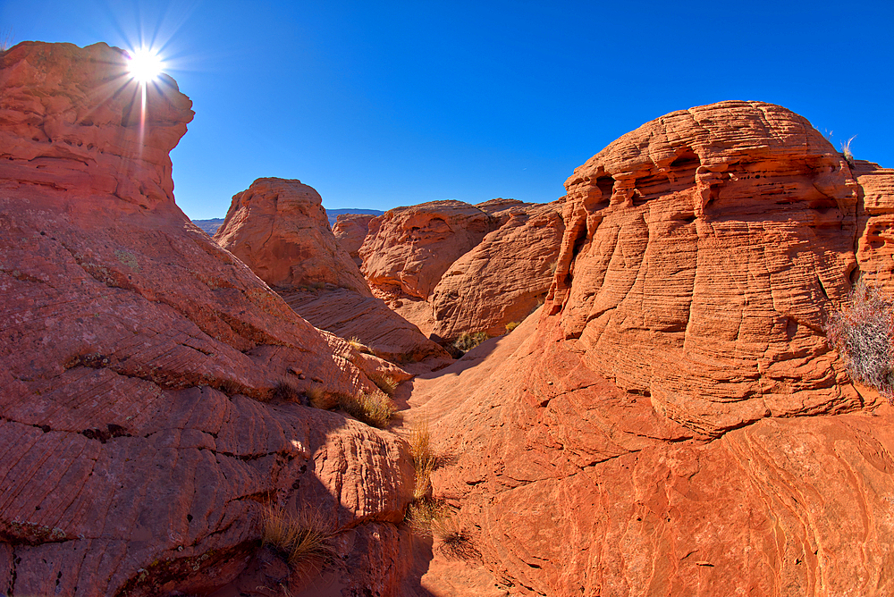 A narrow canyon running between several rock islands at Ferry Swale in the Glen Canyon Recreation Area near Page, Arizona, United States of America, North America