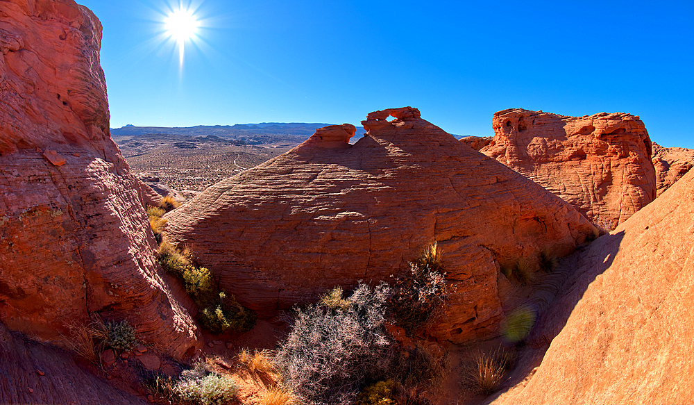 A rock island with a little rock window on its top called the Tea Pot Arch at Ferry Swale in the Glen Canyon Recreation Area near Page, Arizona, United States of America, North America