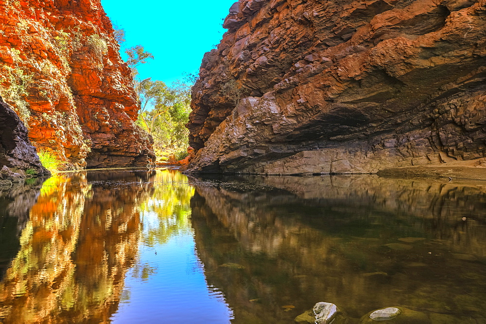 Scenic Simpsons Gap and permanent waterhole reflecting the cliffs in West MacDonnell Ranges, near Alice Springs on Larapinta Trail, Outback, Northern Territory, Australia, Pacific