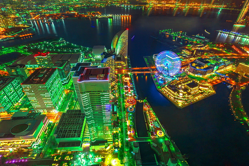 Aerial view of Yokohama Cityscape and skyline at night from viewing platform of Landmark Tower, with skyscrapers from observatory sky garden, illuminated railway and subway, Yokohama, Honshu, Japan, Asia