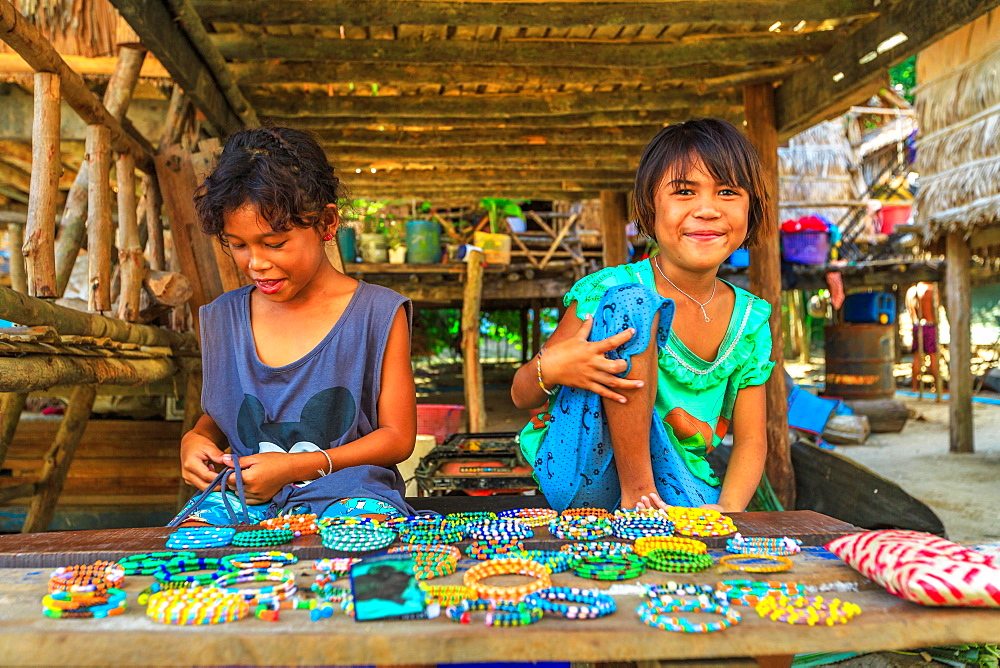 Sea Gypsies, little girls selling necklaces and bracelets in Moken tribe, fisherman village of Ko Surin Marine National Park, Surin Islands, Phang-Nga, Thailand, Southeast Asia, Asia