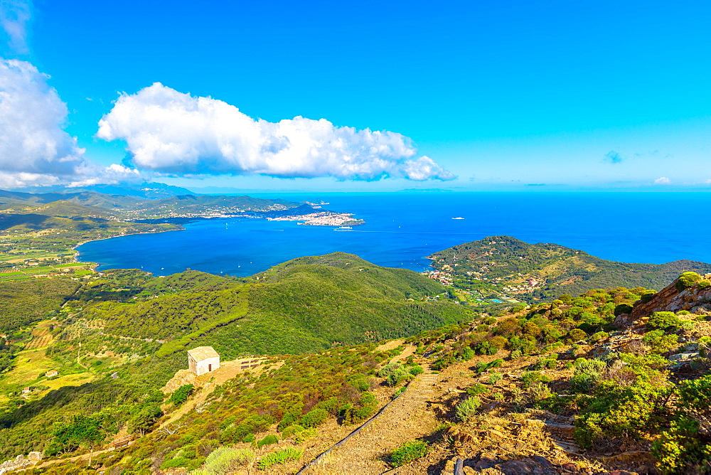 Panoramic view of Portoferraio Gulf, Elba Island, from top of Monte Volterraio on which the fortress dominates north part of island, with Church of San Leonardo in the background, Tuscan Archipelago, Tuscany, Italy, Europe