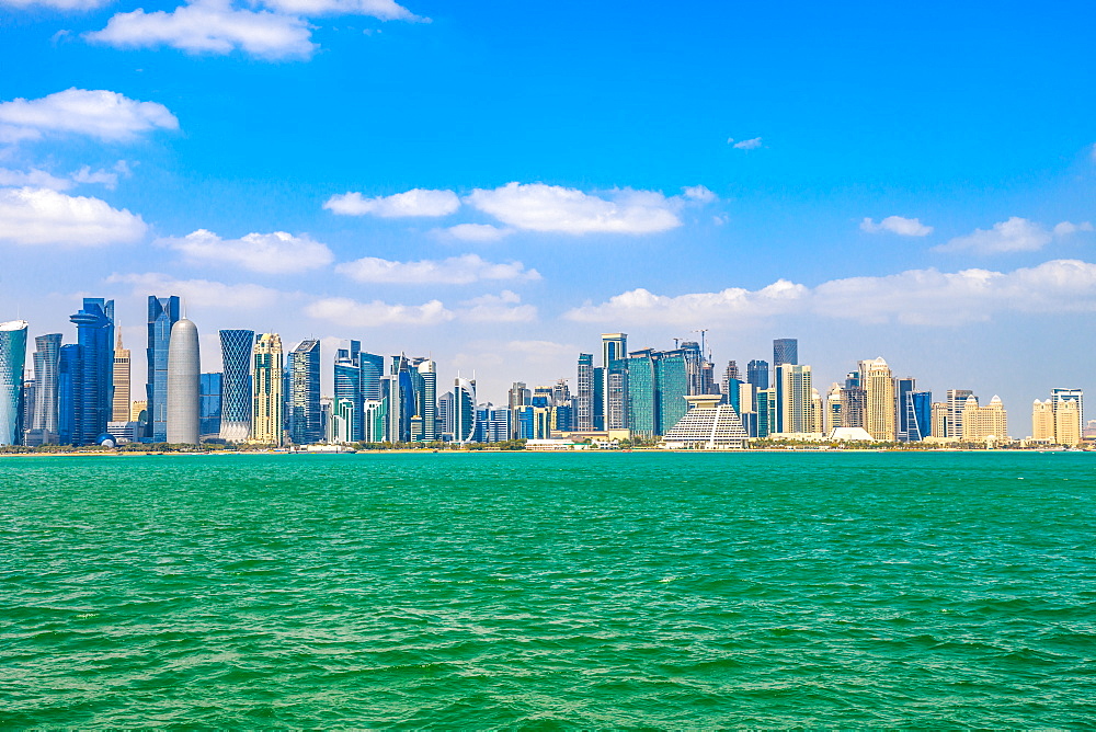 Banner panorama of Doha cityscape, West Bay skyline in Doha Bay, Doha, Qatar, Middle East