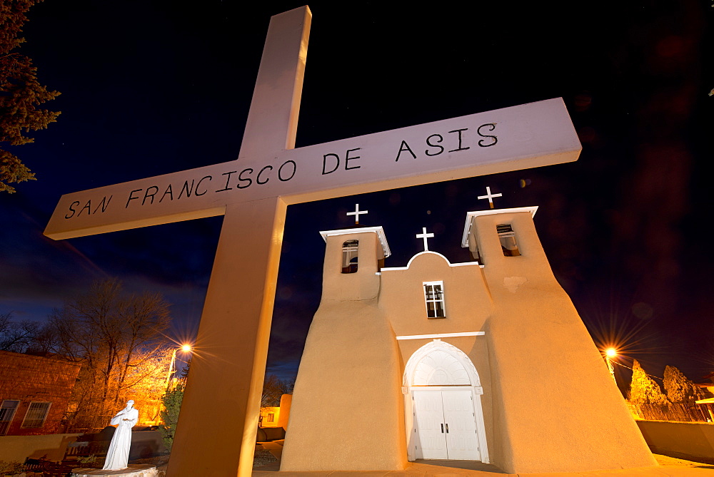 The historic adobe San Francisco de Asis church in Taos at twilight, Taos, New Mexico, United States of America, North America