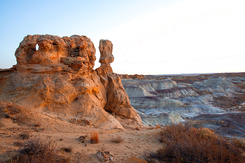 Sandstone sculptures in Bisti/De-Na-Zin Wilderness at dusk, New Mexico, United States of America, North America