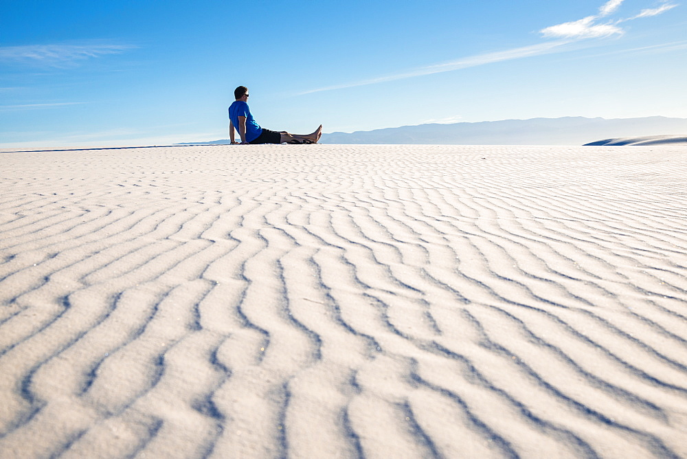 Man gazing out at the view in White Sands National Park, New Mexico, United States of America, North America