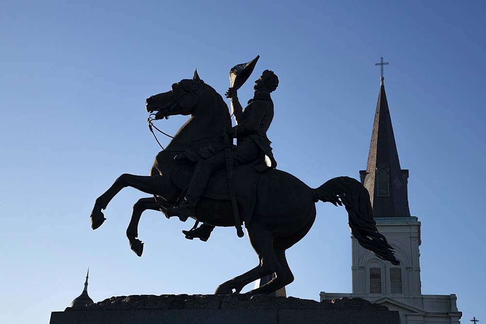 Horse and rider statue of Andrew Jackson in silhouette at New Orleans's famous Jackson Square, New Orleans, Louisiana, United States of America, North America