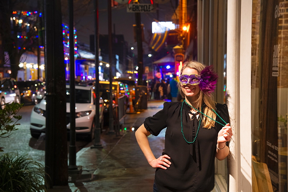 Woman ready to celebrate Mardis Gras on Frenchmen Street, the jazz district of New Orleans, Louisiana, United States of America, North America