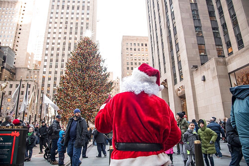 Santa Claus at the Rockefeller Square Christmas tree, Manhattan, New York City, New York, United States of America, North America