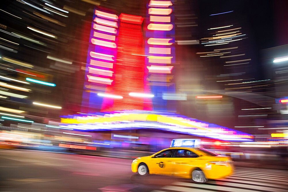 Taxis blurring down a street in Manhattan, New York City, New York, United States of America, North America