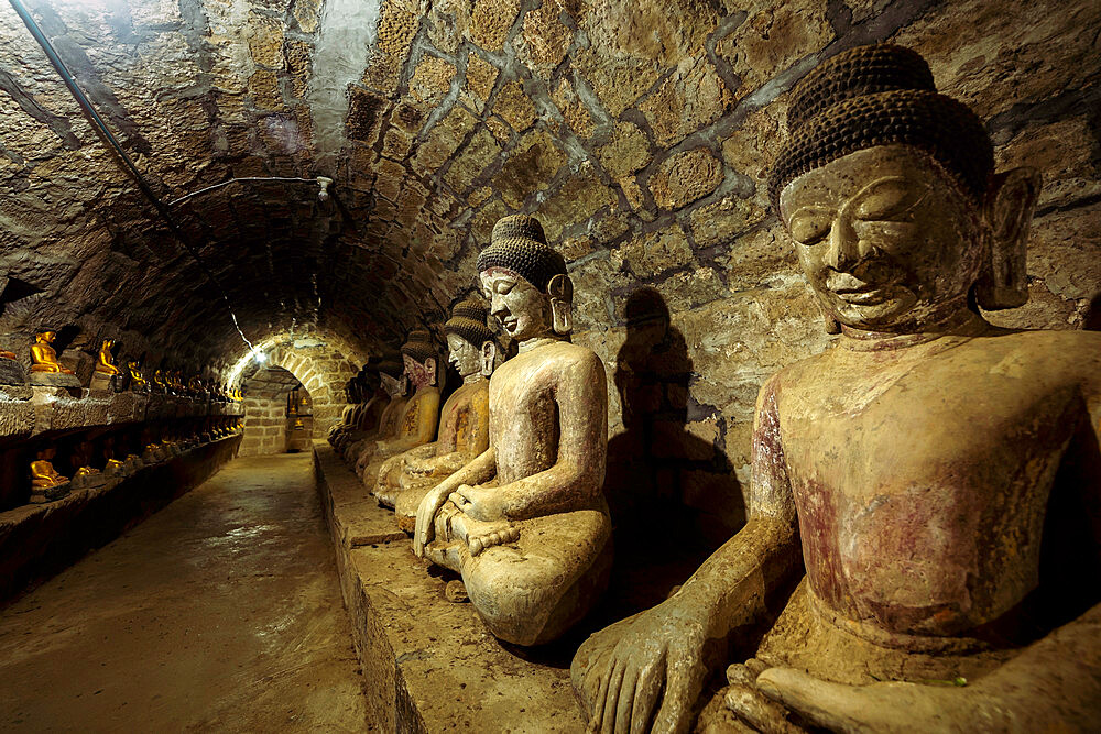 Buddha statues in the underground corridors of Htukkanthein temple, Mrauk U, Rakhine, Myanmar (Burma), Asia