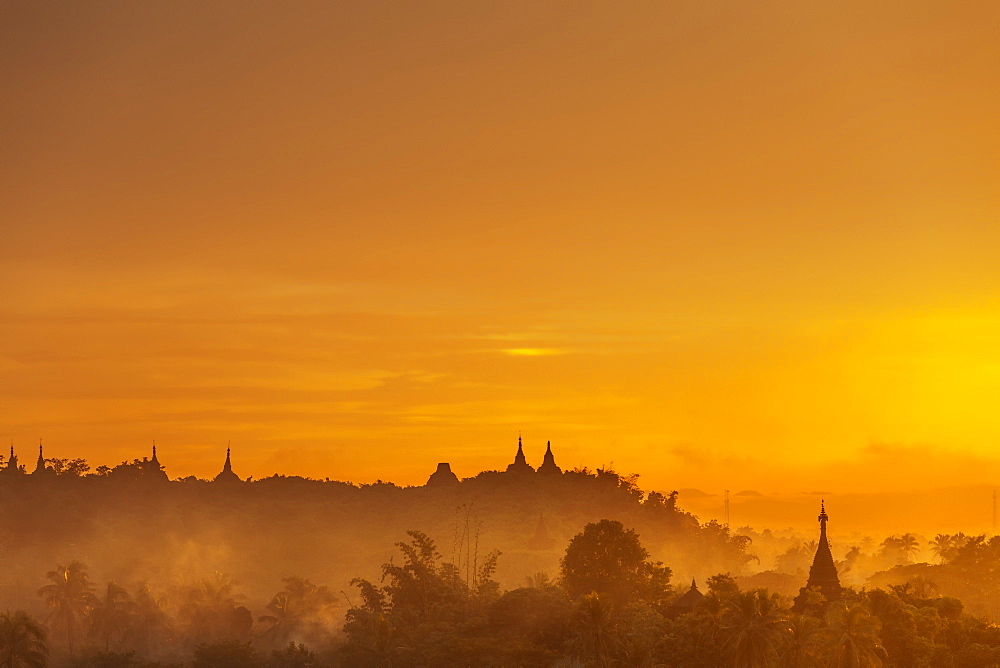 Pagoda spires at sunset, Mrauk U, Rakhine State, Myanmar (Burma), Asia