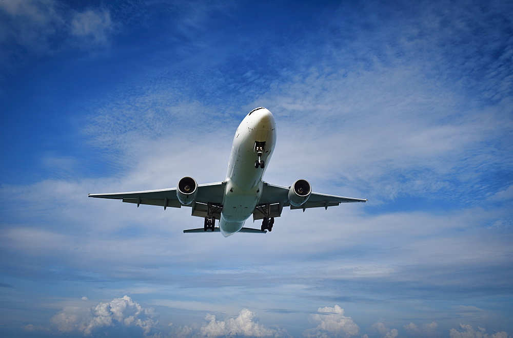 An airplane approaching to land, Thailand, Southeast Asia, Asia