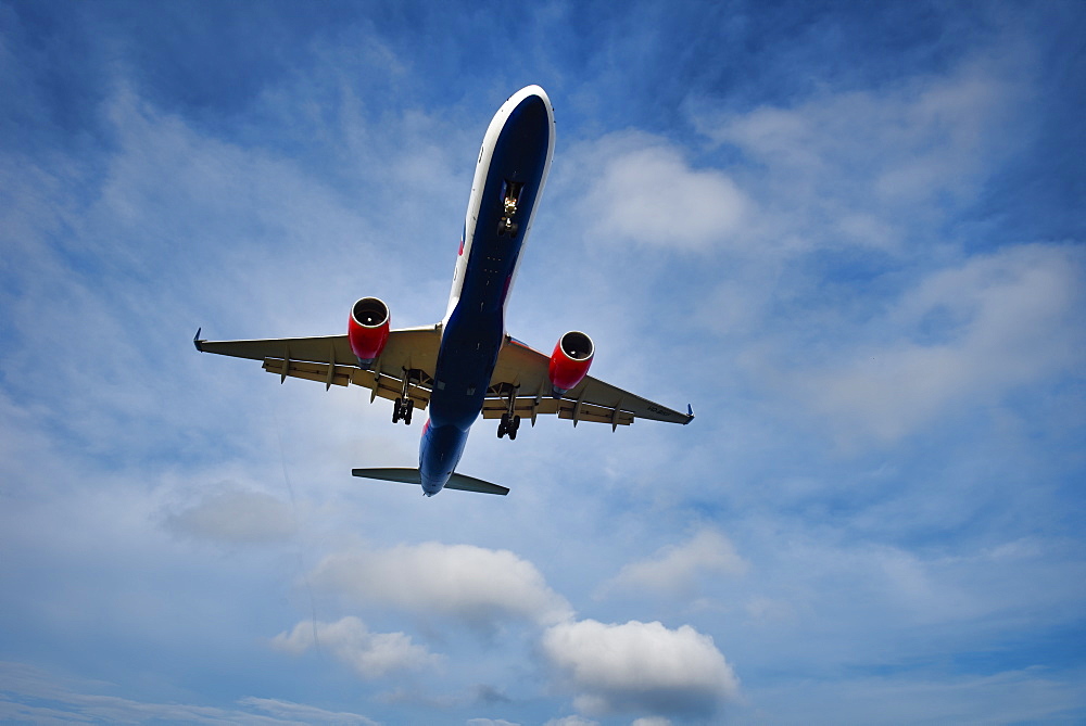 An commercial airliner approaching Phuket International Airport, Thailand, Southeast Asia, Asia