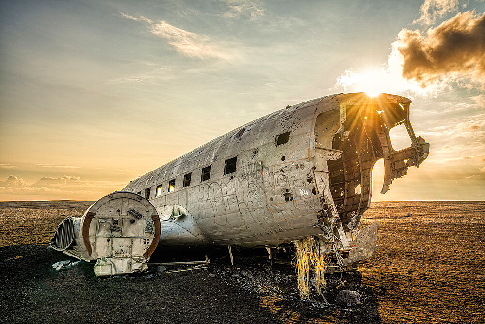 A crashed DC3 aircraft on a black sand beach near Vik, Iceland, Polar Regions