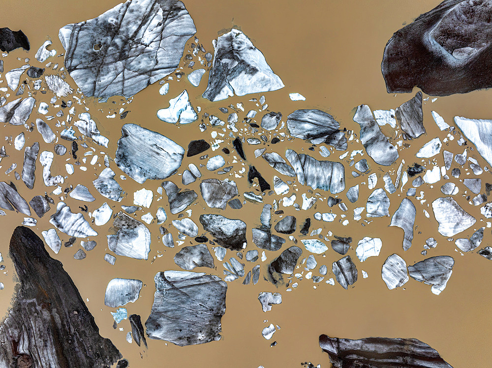 A birdseye view of Svinafellsjokull Glacier fragments in a lagoon in southern Iceland, Polar Regions