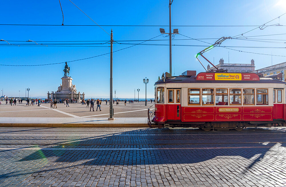 Traditional red Tram in Commerce Square, Lisbon, Portugal, Europe